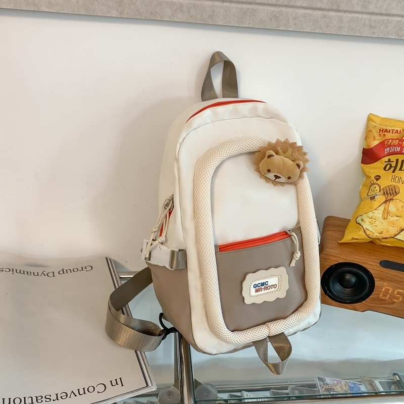 Popular casual crossbody bag, sports backpack, outdoor shoulder bag (white with khaki [with small lion head brooch])