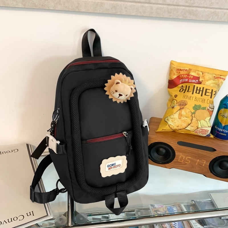Popular casual crossbody bag, sports backpack, outdoor shoulder bag (black [with small lion head brooch])