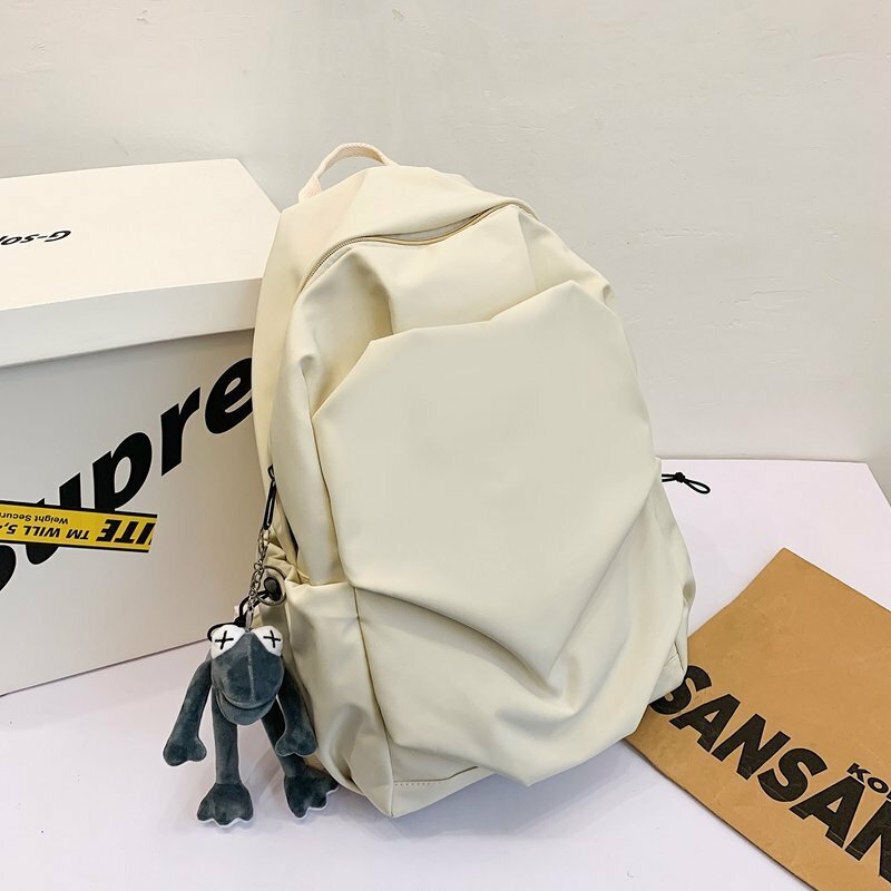 Popular large-capacity travel outdoor backpack and computer bag (off-white [with gray frog pendant])