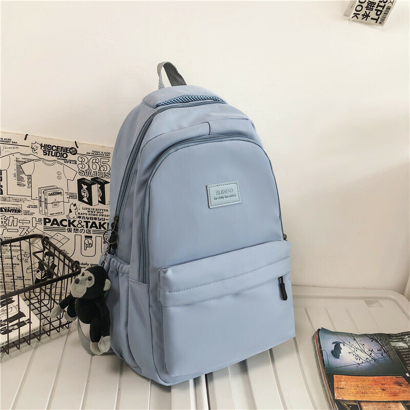 New Large Capacity Travel Outdoor Backpack Computer Bag (Blue [With Chimpanzee Pendant])