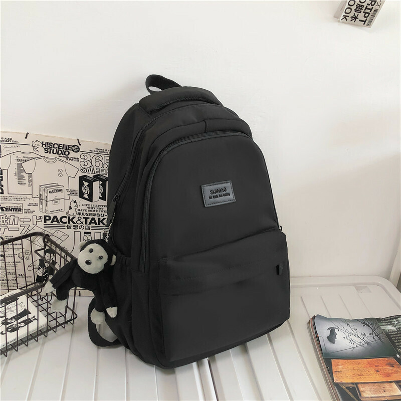 New Large Capacity Travel Outdoor Backpack Computer Bag (Black [With Chimpanzee Pendant])