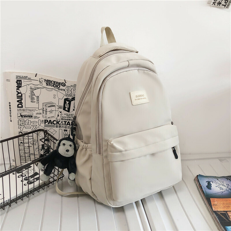 New large-capacity travel outdoor backpack and computer bag (off-white [with chimpanzee pendant])