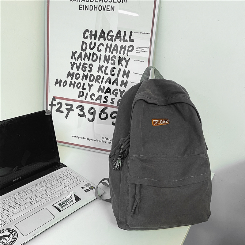 New large-capacity travel outdoor backpack and computer bag (dark gray [with white astronaut pendant])