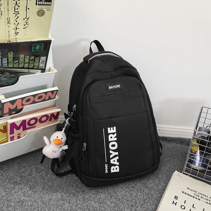 New large-capacity travel outdoor backpack computer bag (black [with big white duck pendant])