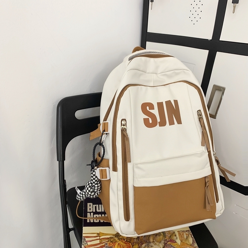 New large-capacity travel outdoor backpack and computer bag (khaki [with black and white checkered keychain pendant])