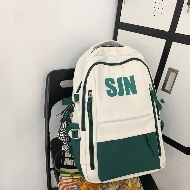 New large-capacity travel outdoor backpack and computer bag (green [with black and white checkered keychain pendant])