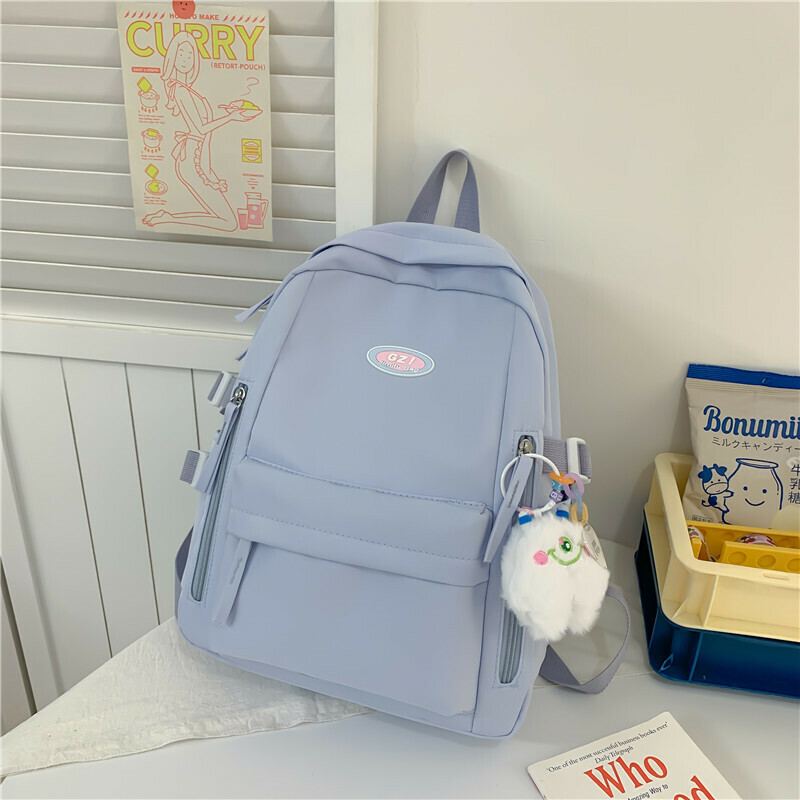 New large-capacity travel outdoor backpack computer bag (blue [with one-eyed pendant])