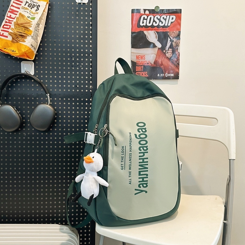 New large capacity travel outdoor backpack computer bag (green [with big white duck pendant])