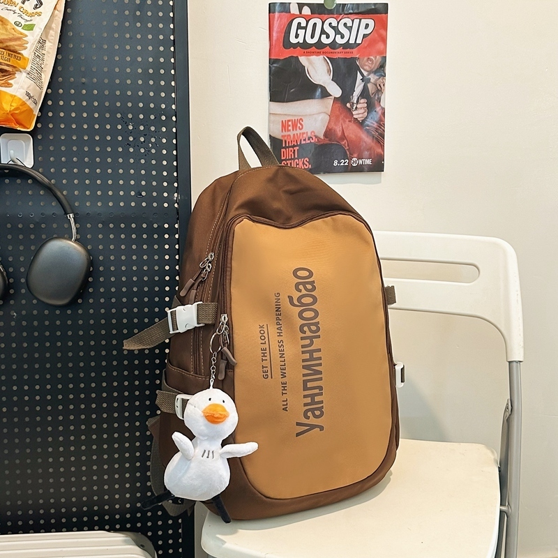 New large-capacity travel outdoor backpack and computer bag (brown [with big white duck pendant])