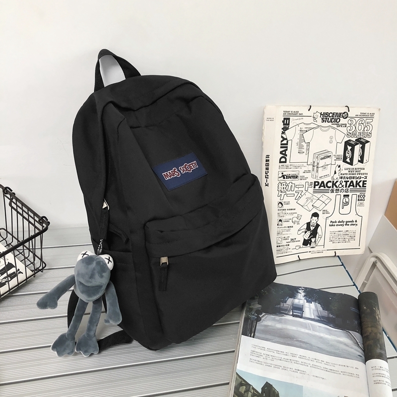 New large-capacity travel outdoor backpack computer bag (black [with gray frog pendant])
