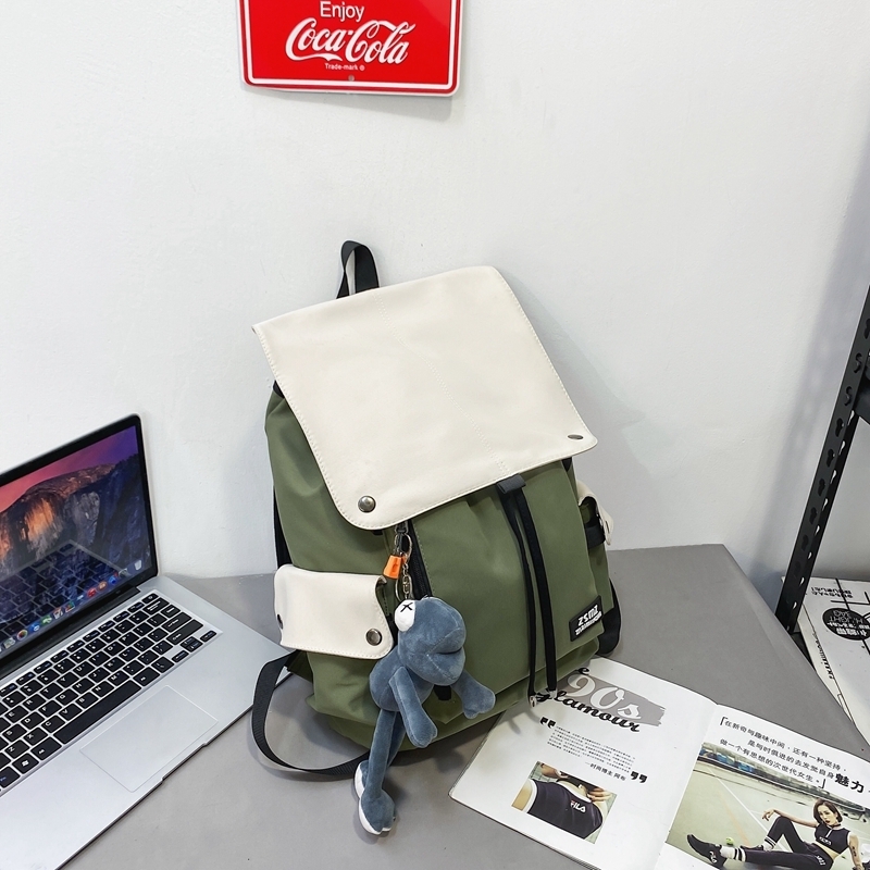 New large-capacity travel outdoor backpack and computer bag (green and white [with gray frog pendant])
