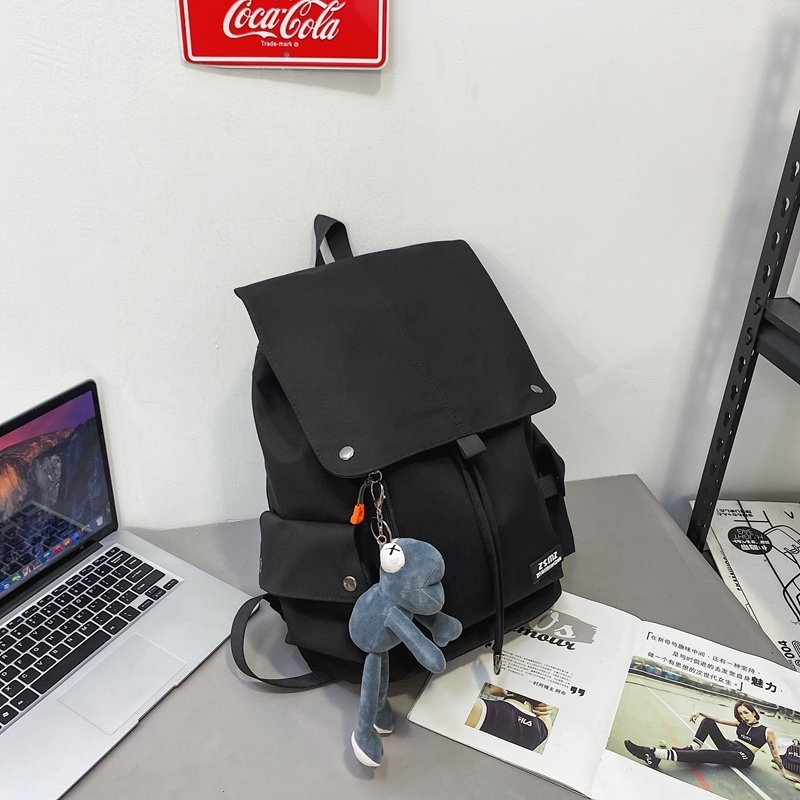 New large-capacity travel outdoor backpack computer bag (black [with gray frog pendant])
