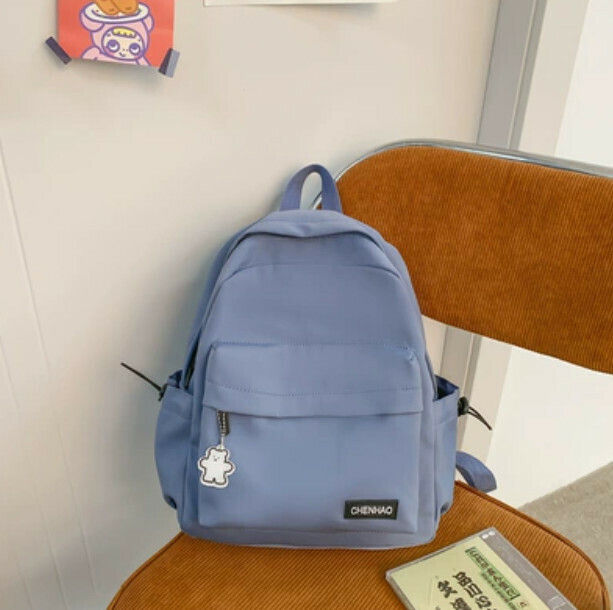 New simple and versatile small backpack for women (blue with 1 badge)