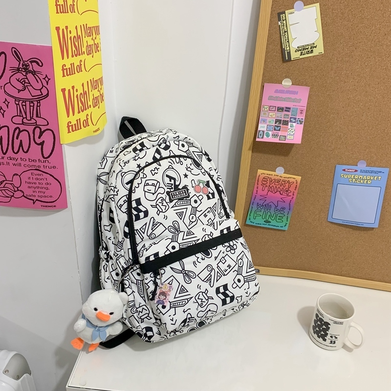 New large-capacity travel outdoor backpack school bag backpack (black [with sailor duck pendant])