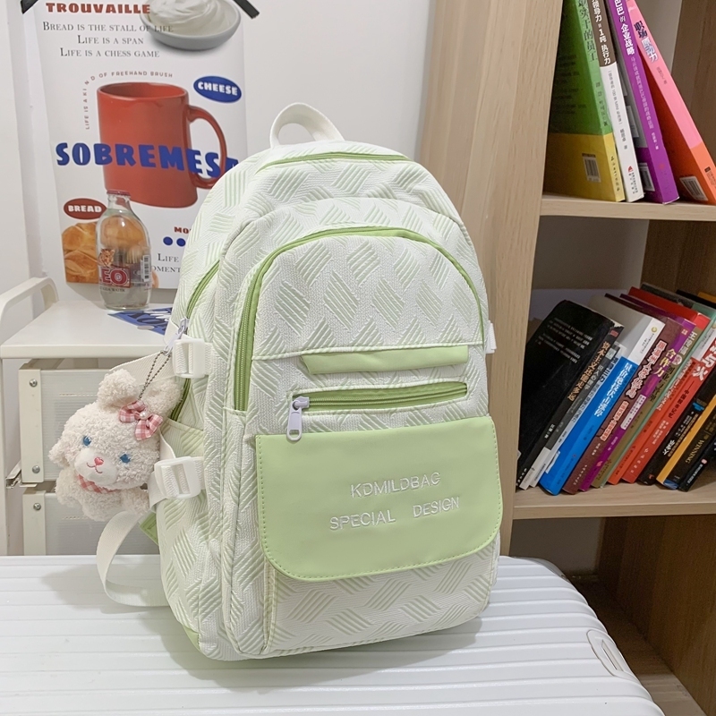 New large-capacity travel outdoor backpack school bag backpack (fruit green [with blue-eyed rabbit pendant])