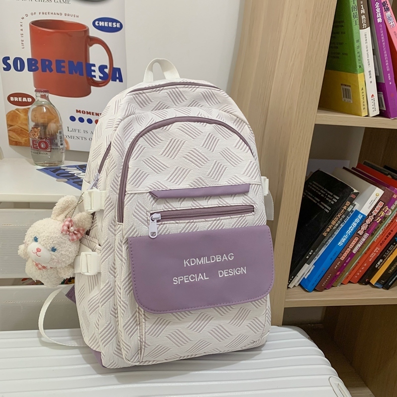 New large-capacity travel outdoor backpack school bag backpack (purple [with blue-eyed rabbit pendant])