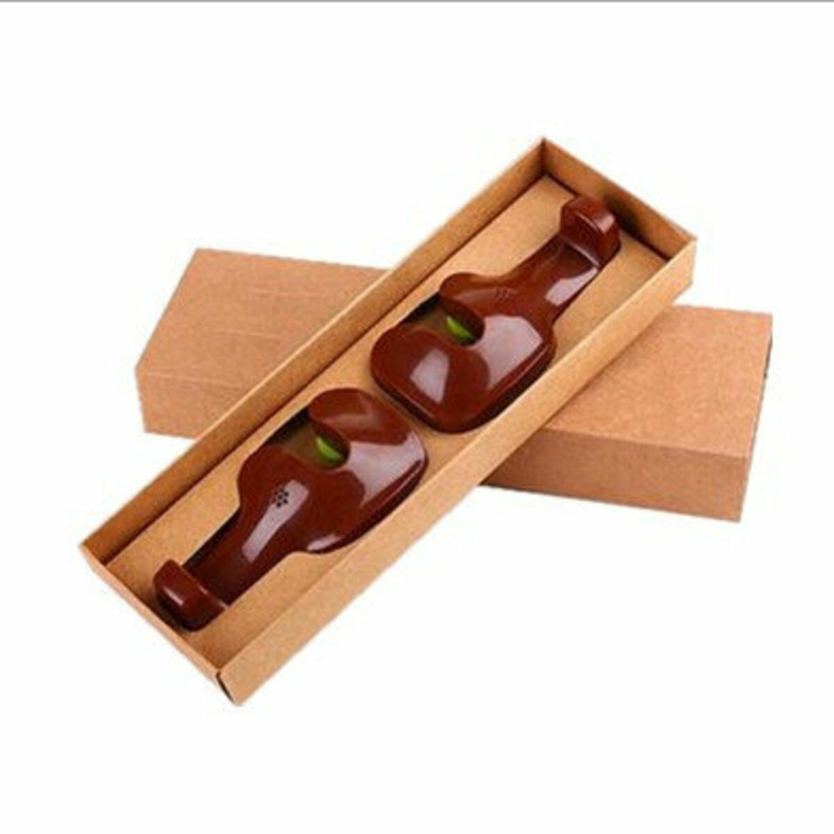 A pair of multi-functional seatback headrest hooks (brown style random) for automobiles