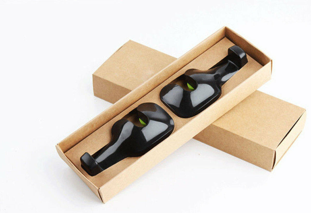 A pair of multi-functional seatback headrest hooks for automobiles (black style random).