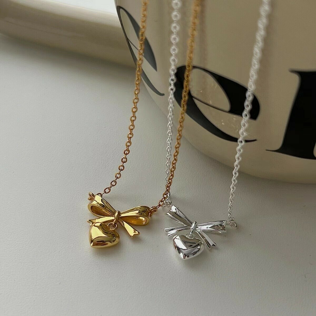 B02蝴蝶結愛心純銀鎖骨鏈