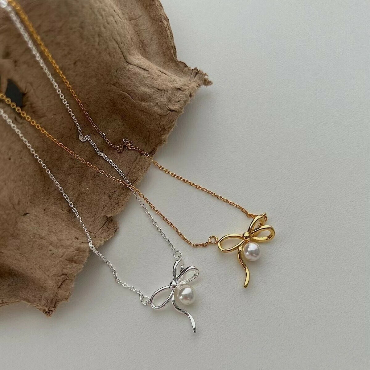 B06蝴蝶結珍珠純銀鎖骨鏈