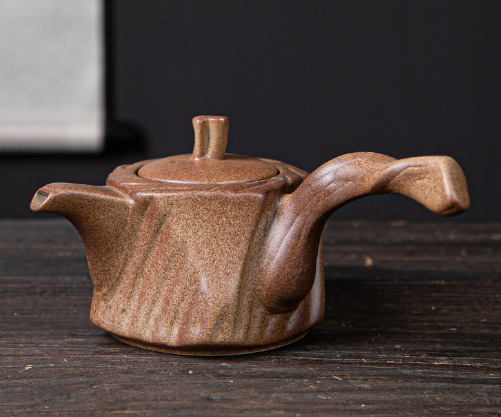 Popular teapot (firewood-fired teapot with dead branch side handle)