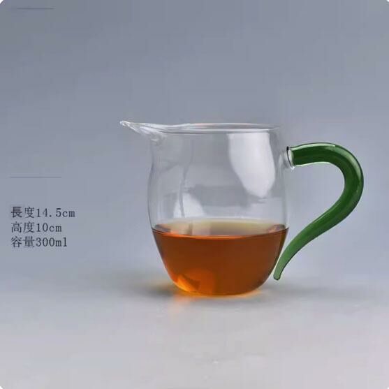 Popular tea-making tea dispenser fair cup (green handle fair cup)