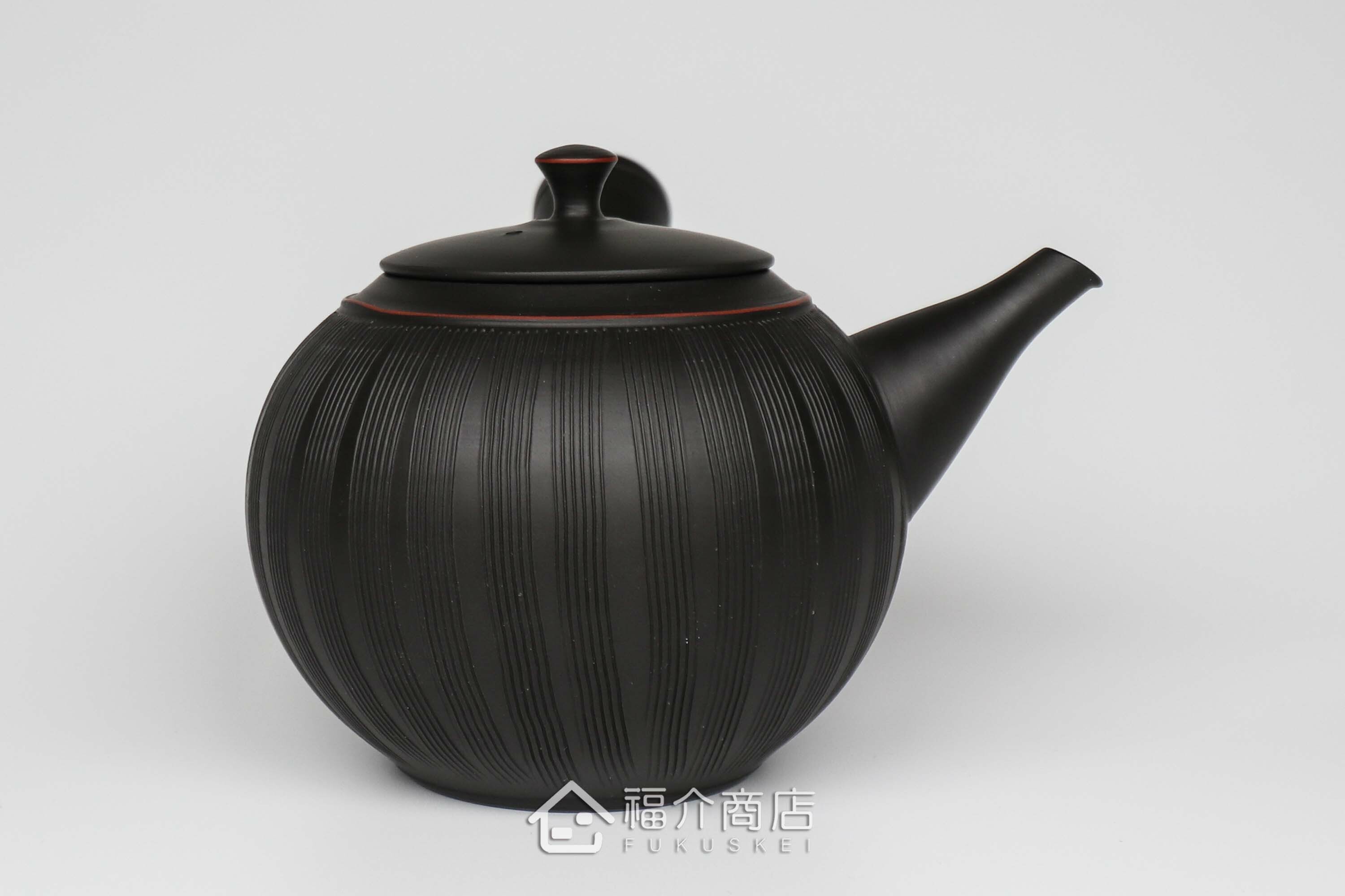 泡茶用的陶瓷材質黑色線條造型泡茶壺