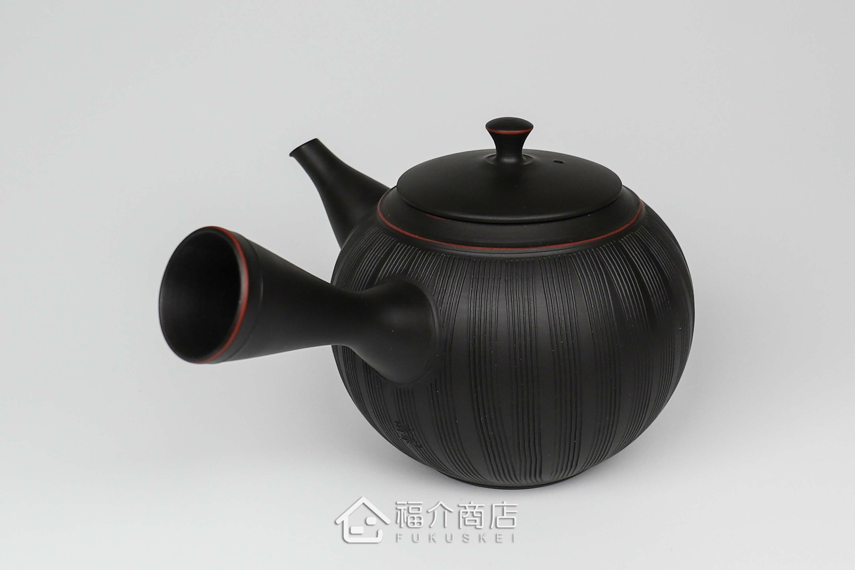 泡茶用的陶瓷材質黑色線條造型泡茶壺