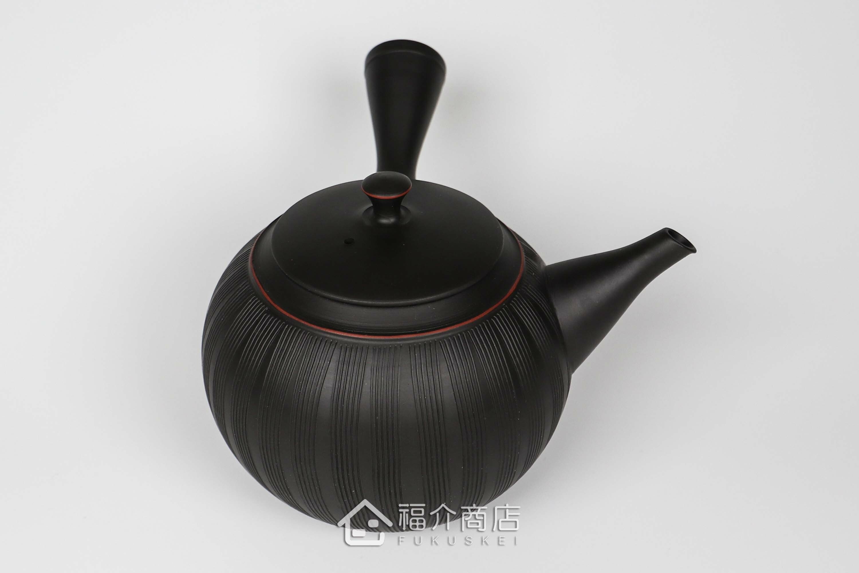 泡茶用的陶瓷材質黑色線條造型泡茶壺