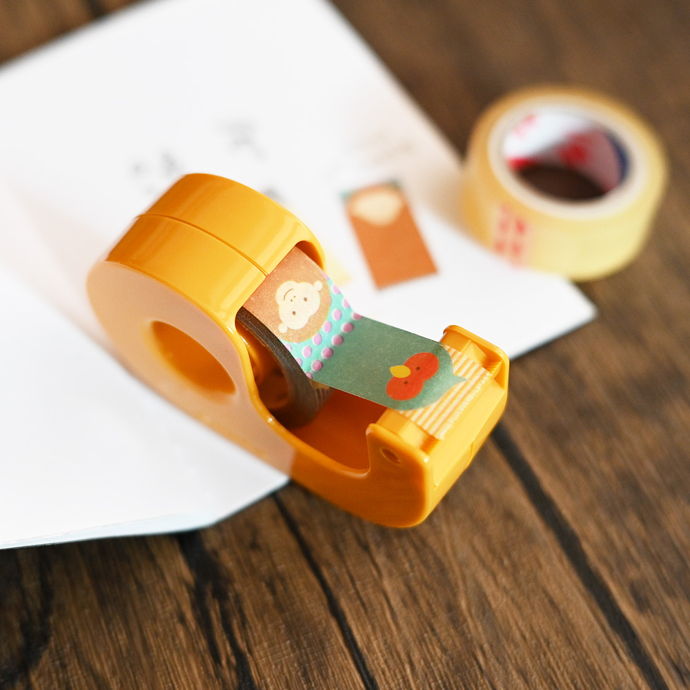 NICHIBAN 直線安全膠帶台：內附一捲NICHIBAN手撕得斷的透明膠帶