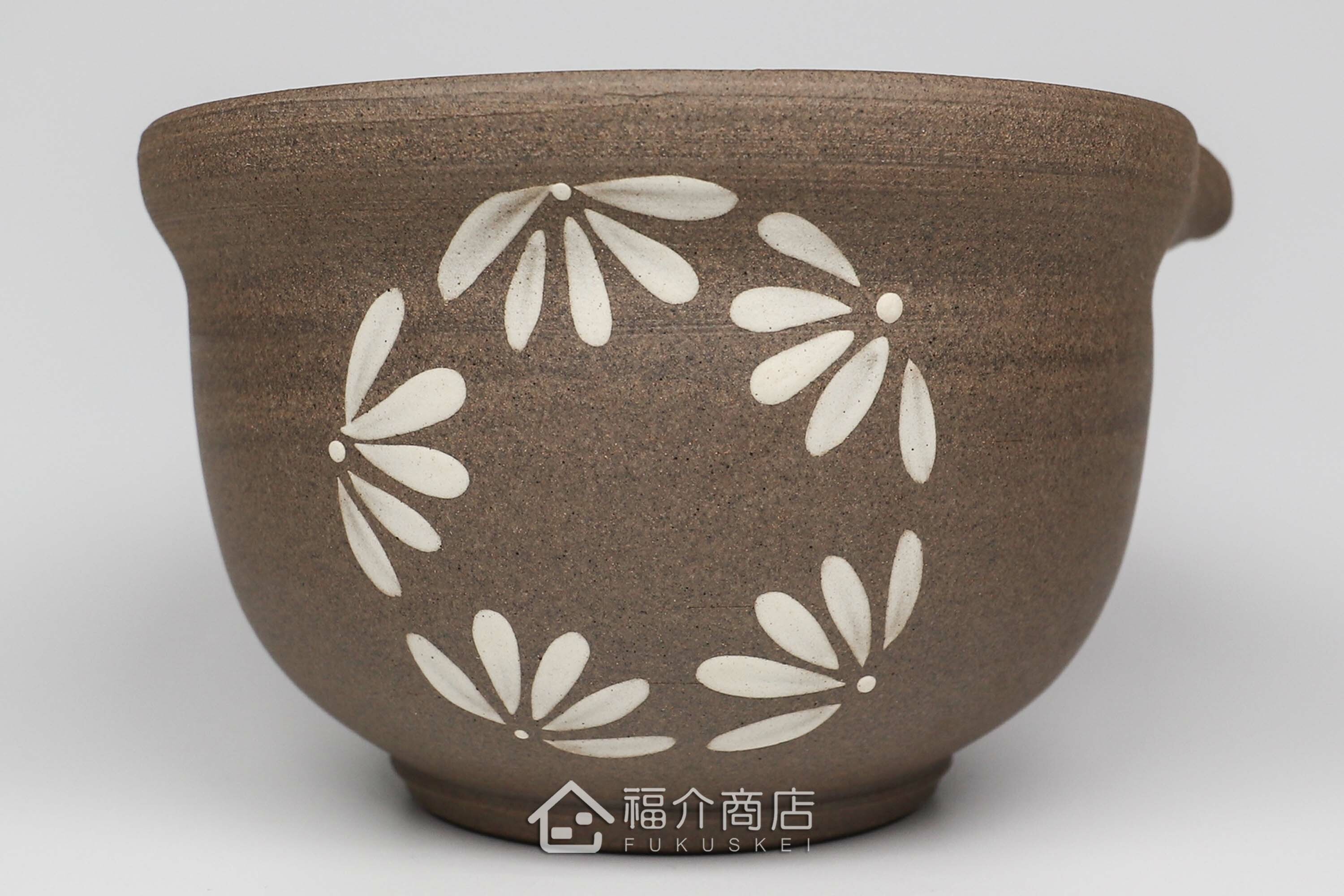 泡茶時將茶水分別倒入杯子的花造型日本陶瓷材質分茶壺