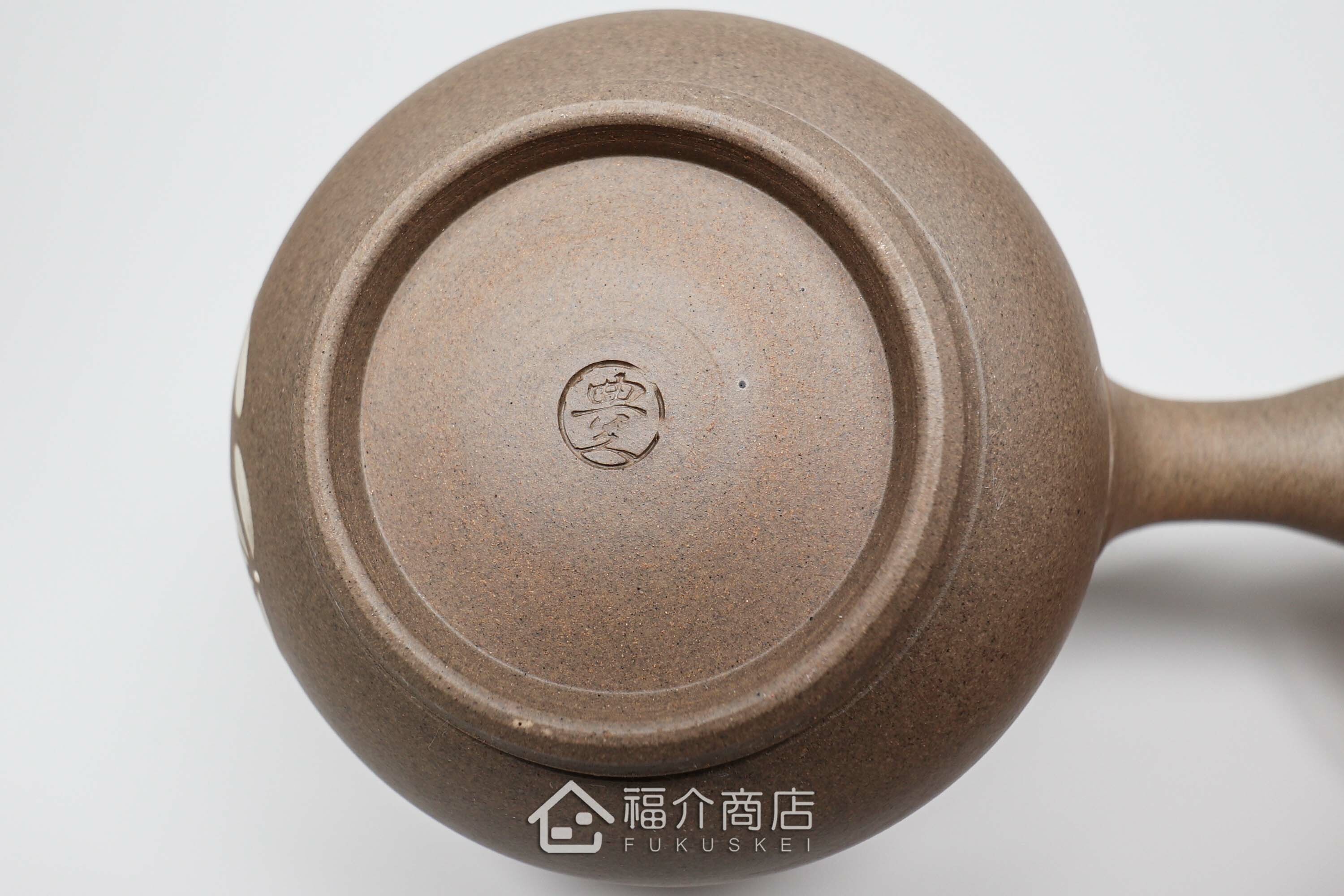 泡茶時將茶水分別倒入杯子的花造型日本陶瓷材質分茶壺