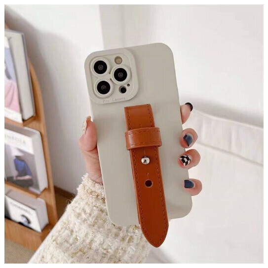 The new mobile phone case is suitable for iphone14promax Apple 13/12 [angel eye white + leather wristband] (contact customer service to confirm the phone model after placing the order)