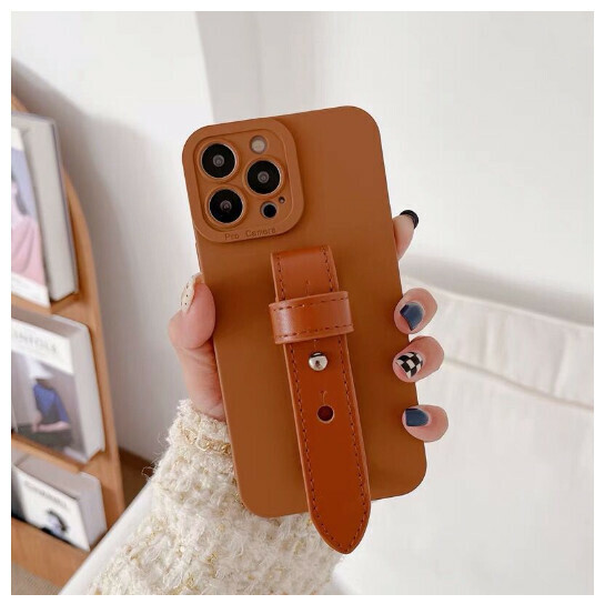 The new mobile phone case is suitable for iPhone 14 Promax Apple 13/12 [Angel Eyes Brown + Leather Wristband] (contact customer service to confirm the phone model after placing the order)