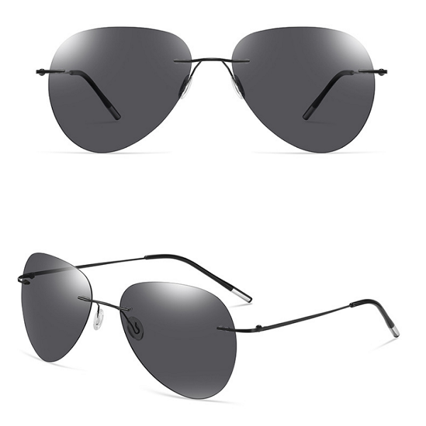 Hot new ultra-light titanium light polarized frameless color-changing sunglasses (nude mirror black frame + black gray lens)
