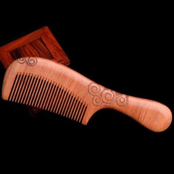 Popular peach wood carved wood comb