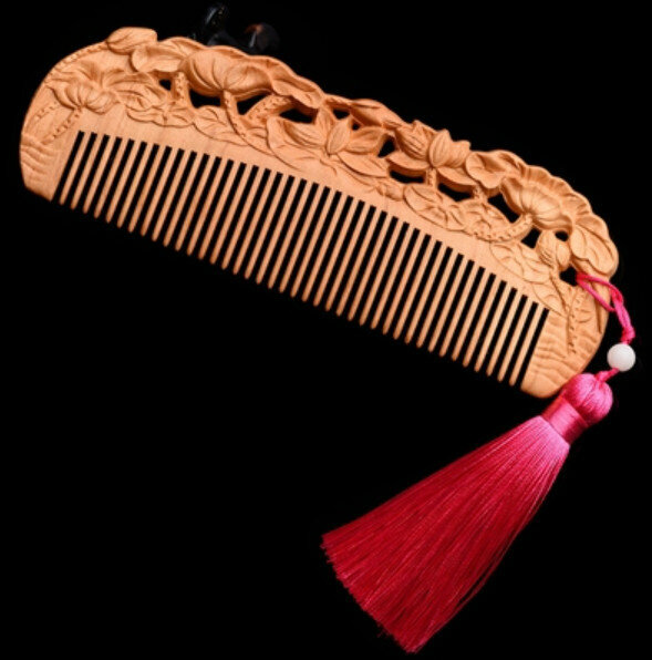 Popular peach wood carved wood comb
