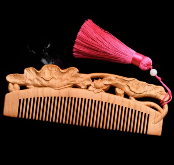 Popular peach wood carved wood comb