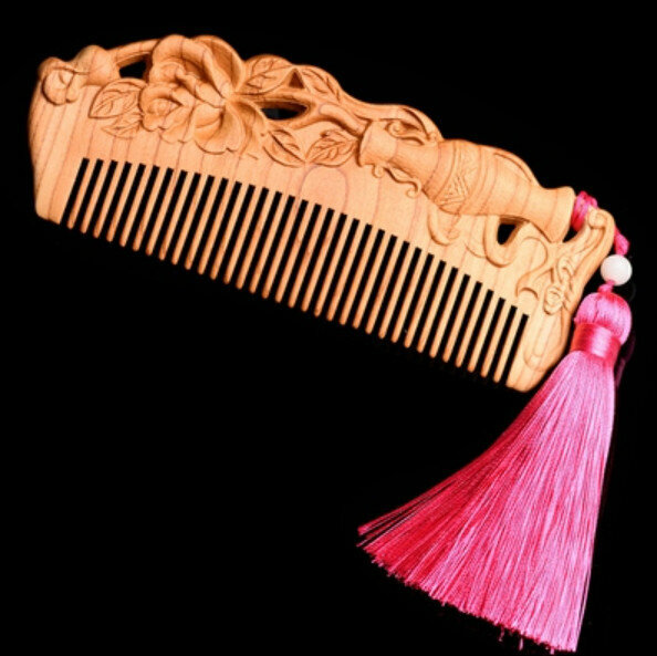 Popular peach wood carved wood comb
