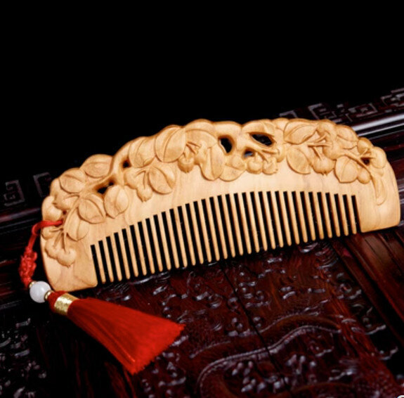 Popular peach wood carved comb