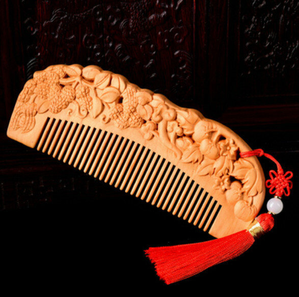 Popular peach wood carved comb