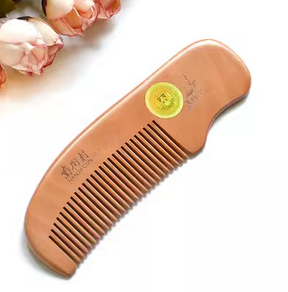 Popular small peach wood comb (total length in simple package is about 12 cm)