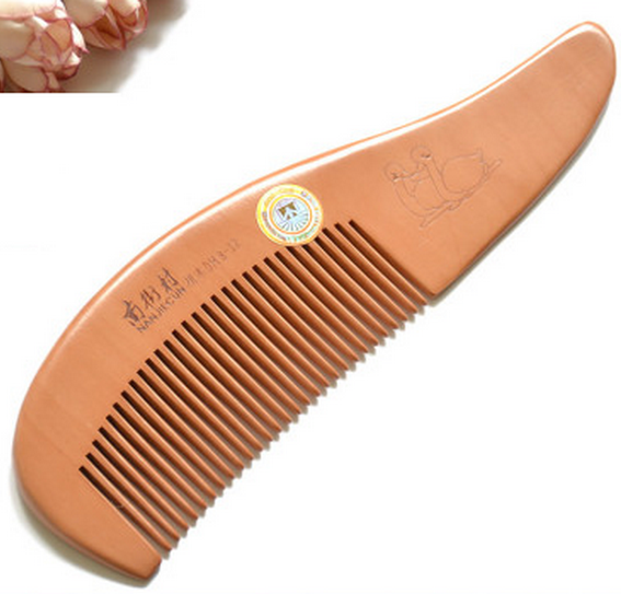 Popular natural solid wood anti-static peach wood comb (simple package, total length 18 cm)