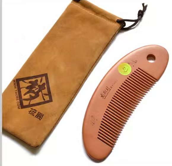 Popular anti-static and anti-hair loss peach wood comb (packaged in cloth bag) about 16 cm
