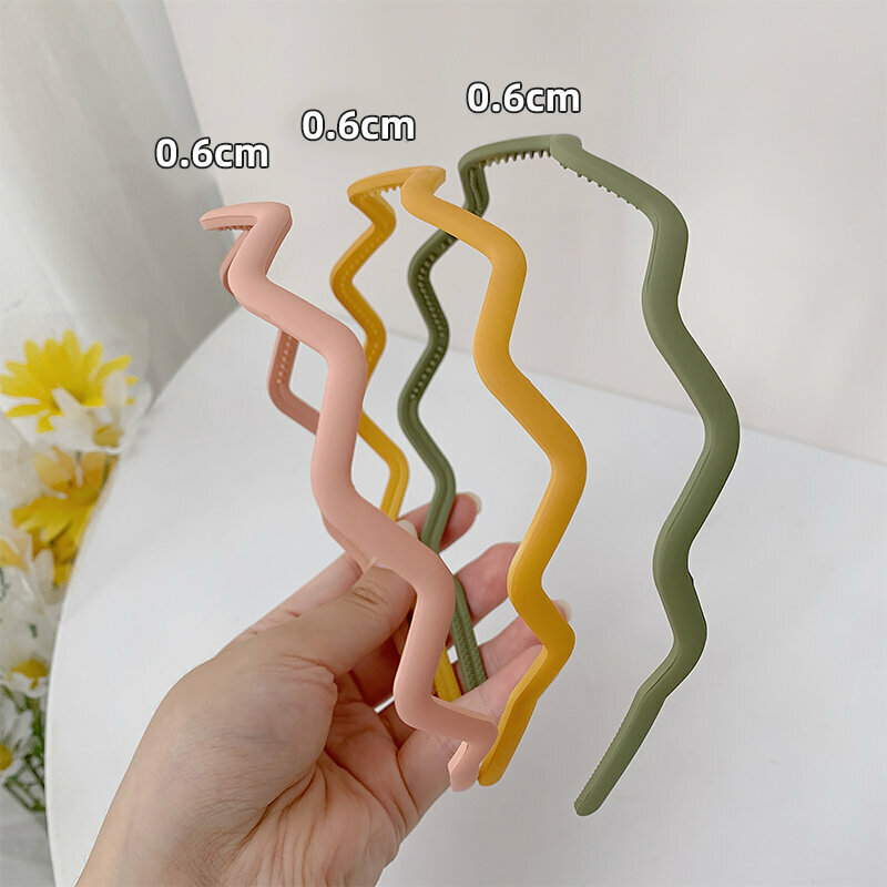 Hotly recommended fashionable hair hoops (wavy pink + yellow + green - 3-piece set)