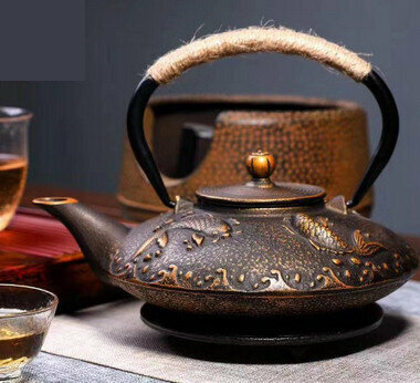 Hot recommended teapot cast iron kettle uncoated tea set (specification: black gold Pisces)