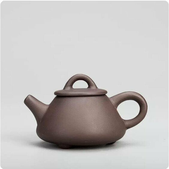 Hot style simple purple sand fingertip teapot (black mudstone scoop teapot)