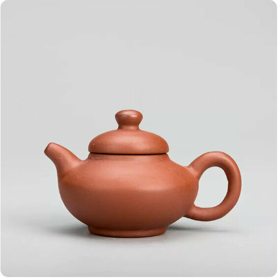 Popular simple purple sand fingertip teapot (red clay flat teapot)