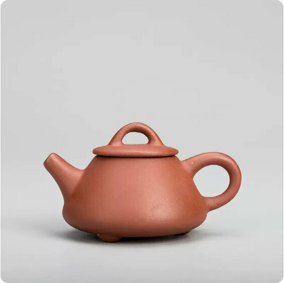 Popular simple purple sand fingertip teapot (red mudstone scoop teapot)