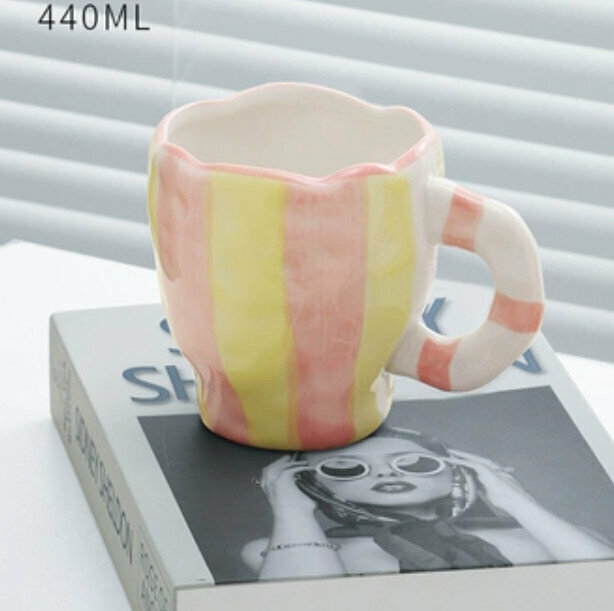Popular hand-squeezed ceramic mug [pink and yellow stripes]